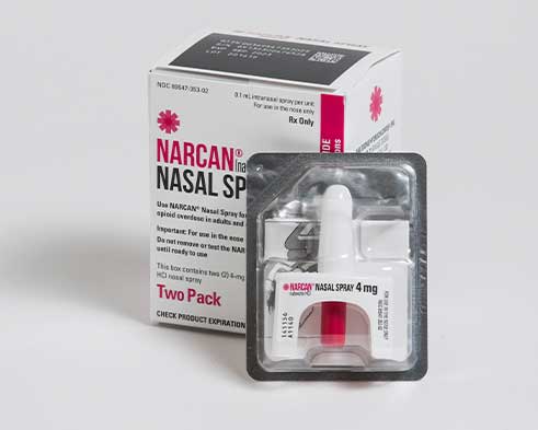 Narcan nasal spray 4 mg in packaging. The box is white with red text and includes a visible spray applicator in a separate plastic casing