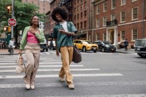 Couple of young generation Z friends in downtown New York enjoying a day together.