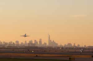 Airplane Take Off from JFK Airport with New York City Skyline